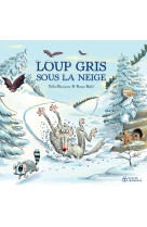 Loup gris sous la neige